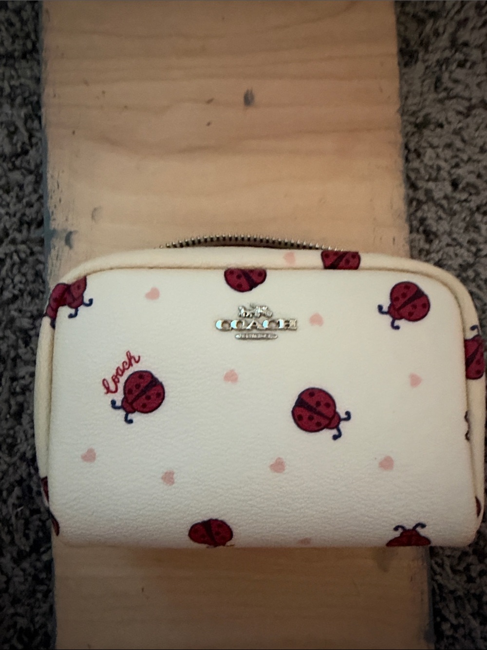 Coach Cream Wallet with Red Ladybug Print